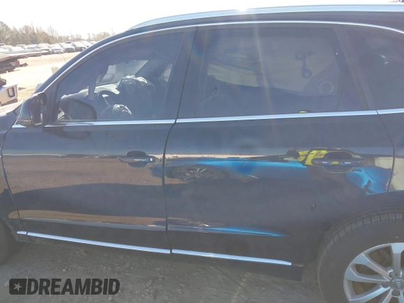 2014 Audi Q5 Premium with VIN WA1CFAFP4EA017515, listed as a IAAI auction lot 41000205 with 194,104 mi miles and . Bid and sale history available at DreamBid. Image 15.