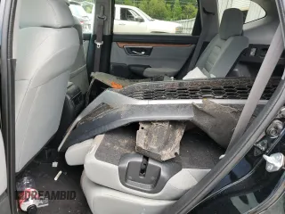 2020 Honda CR-V EX with VIN 2HKRW1H53LH413212, listed as a Copart auction lot 57423095 with 143,553 mi miles and Salvage title. Bid and sale history available at DreamBid. Image 11.