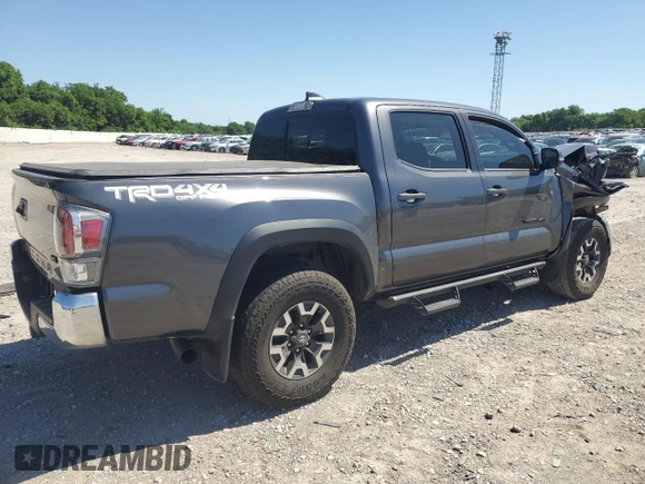 2023 Toyota Tacoma SR with VIN 3TYCZ5AN9PT131515, listed as a Copart auction lot 57900865 with Not provided miles and Salvage title. Bid and sale history available at DreamBid. Image 3.