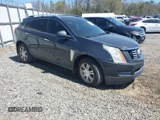 2015 Cadillac SRX Luxury Collection z VIN 3GYFNBE38FS610508, wystawiony jako IAAI lot #41855336 z przebiegiem 145 910 mil mil oraz . Historia ofert i sprzedaży dostępna na DreamBid. Obrazek 1.