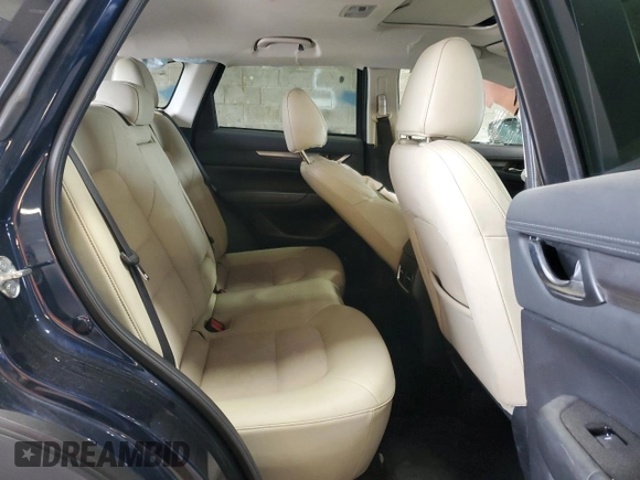 2018 Mazda CX-5 Touring z VIN JM3KFBCM3J0464815, wystawiony jako Copart lot #58794685 z przebiegiem Nie podano mil oraz Szkoda całkowita • Salvage title. Historia ofert i sprzedaży dostępna na DreamBid. Obrazek 11.