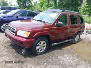 2002 Nissan Pathfinder SE z VIN JN8DR09Y52W737232, wystawiony jako IAAI lot #42381901 z przebiegiem 272 847 mil mil oraz . Historia ofert i sprzedaży dostępna na DreamBid. Obrazek 17.