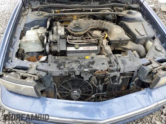 1995 Cadillac DeVille z VIN 1G6KD52B3SU243924, wystawiony jako Copart lot #56945395 z przebiegiem 72 878 mil mil oraz Szkoda całkowita • Salvage title. Historia ofert i sprzedaży dostępna na DreamBid. Obrazek 11.