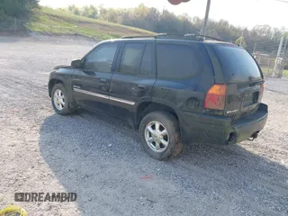 2006 GMC Envoy SLE with VIN 1GKDT13S262204960, listed as a IAAI auction lot 42045236 with 183,338 mi miles. Bid and sale history available at carsss.com. Image 3.