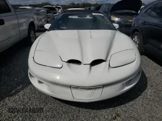 2001 Pontiac Firebird Firebird z VIN 2G2FS32K912126317, wystawiony jako Copart lot #74510454 z przebiegiem Nie podano mil oraz Szkody całkowita. Historia ofert i sprzedaży dostępna na DreamBid. Obrazek 5.