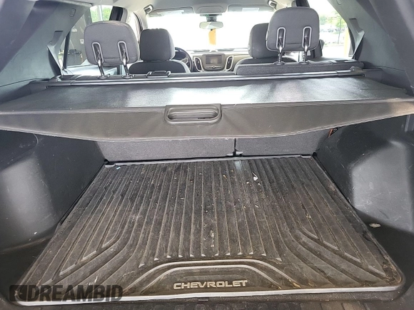 2020 Chevrolet Equinox LT with VIN 2GNAXJEV0L6236404, listed as a IAAI auction lot 42619695 with 77,124 mi miles and . Bid and sale history available at DreamBid. Image 28.