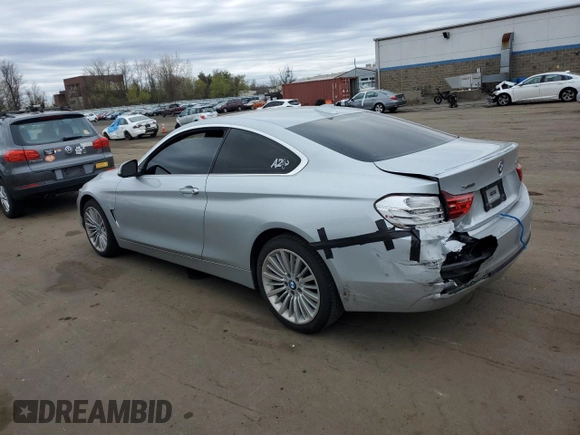 2016 BMW 4 Series 428i xDrive with VIN WBA3N9C56GK249666, listed as a Copart auction lot 53881285 with 140,031 mi miles and Salvage title. Bid and sale history available at DreamBid. Image 2.