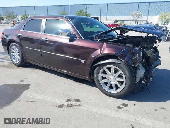 2005 Chrysler 300 with VIN 2C3JA63H25H102333, listed as a IAAI auction lot 41967876 with 125,092 mi miles. Bid and sale history available at carsss.com. Image 1.