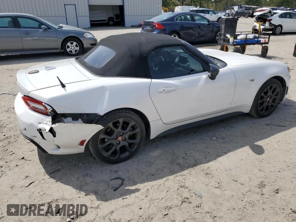 2017 FIAT 124 Spider Lusso z VIN JC1NFAEK0H0116019, wystawiony jako Copart lot #51153275 z przebiegiem 41 415 mil mil oraz Szkoda całkowita • Salvage title. Historia ofert i sprzedaży dostępna na DreamBid. Obrazek 3.
