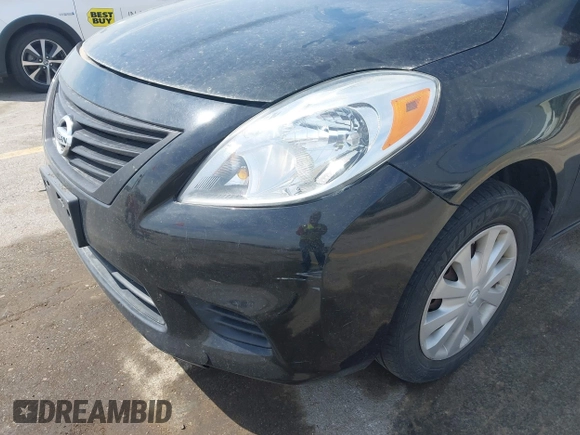 2012 Nissan Versa SV with VIN 3N1CN7AP0CL810645, listed as a IAAI auction lot 42047617 with 115,877 mi miles. Bid and sale history available at carsss.com. Image 6.