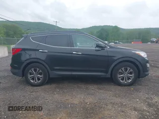 2014 Hyundai Santa Fe z VIN 5XYZUDLB9EG224174, wystawiony jako IAAI lot #42244140 z przebiegiem 84 341 mil mil oraz . Historia ofert i sprzedaży dostępna na DreamBid. Obrazek 13.