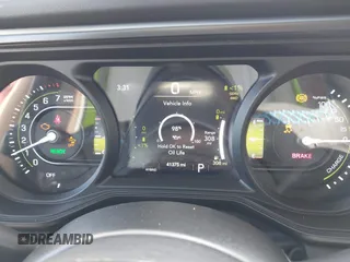 2024 Jeep Wrangler Rubicon X z VIN 1C4RJXR6XRW240316, wystawiony jako IAAI lot #42477607 z przebiegiem 41 375 mil mil oraz . Historia ofert i sprzedaży dostępna na DreamBid. Obrazek 7.