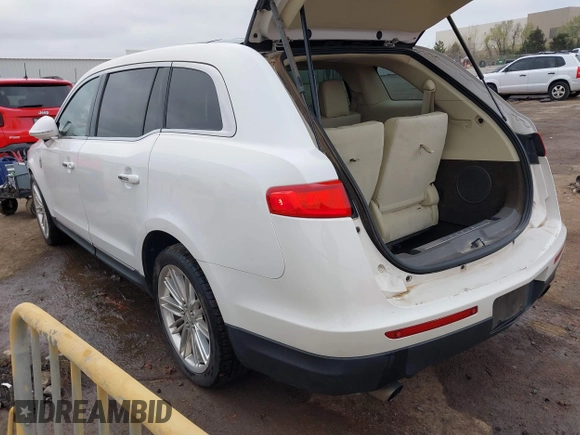 2014 Lincoln MKT EcoBoost with VIN 2LMHJ5AT0EBL50661, listed as a IAAI auction lot 41898237 with 118,770 mi miles and . Bid and sale history available at DreamBid. Image 3.