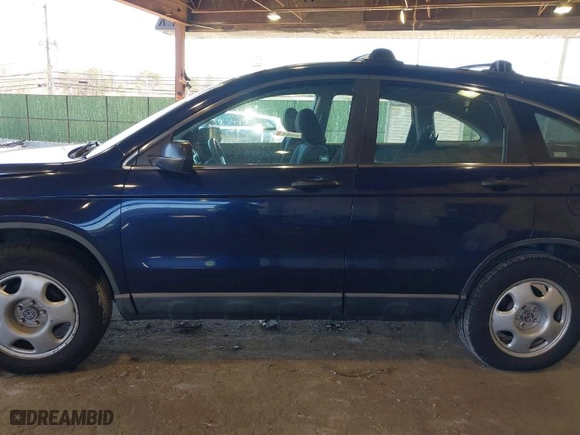 2009 Honda CR-V LX with VIN 5J6RE483X9L061781, listed as a IAAI auction lot 41893907 with 211,511 mi miles. Bid and sale history available at carsss.com. Image 15.