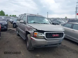 2002 GMC Yukon SLT z VIN 1GKEK13ZX2J247186, wystawiony jako IAAI lot #42095882 z przebiegiem 271 728 mil mil oraz . Historia ofert i sprzedaży dostępna na DreamBid. Obrazek 1.