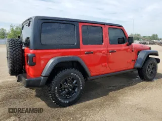 2022 Jeep Wrangler Unlimited Willys with VIN 1C4HJXDN7NW217581, listed as a Copart auction lot 64223115 with 51,132 mi miles and Clean title. Bid and sale history available at DreamBid. Image 3.