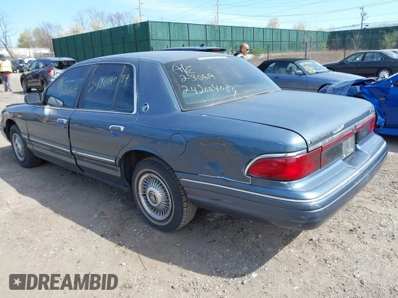 1996 Mercury Grand Marquis GS with VIN 2MELM74W8TX697141, listed as a IAAI auction lot 42082750 with 138,963 mi miles and . Bid and sale history available at DreamBid. Image 3.