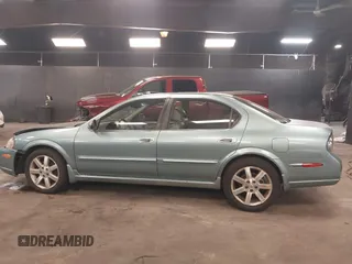 2002 Nissan Maxima GLE z VIN JN1DA31A12T308581, wystawiony jako IAAI lot #41742949 z przebiegiem 116 892 mil mil oraz . Historia ofert i sprzedaży dostępna na DreamBid. Obrazek 14.