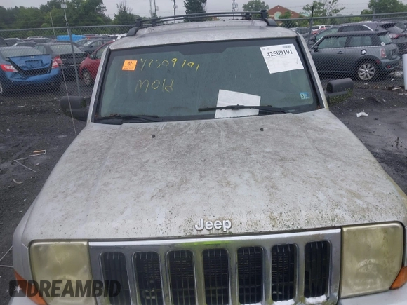 2007 Jeep Commander Sport z VIN 1J8HG48K47C501728, wystawiony jako IAAI lot #42509191 z przebiegiem Nie podano mil oraz . Historia ofert i sprzedaży dostępna na DreamBid. Obrazek 6.