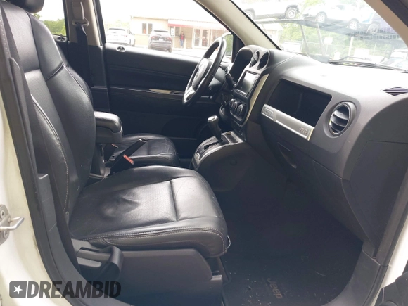 2016 Jeep Compass High Altitude with VIN 1C4NJDEB0GD546305, listed as a IAAI auction lot 42371770 with 158,486 mi miles and . Bid and sale history available at DreamBid. Image 5.