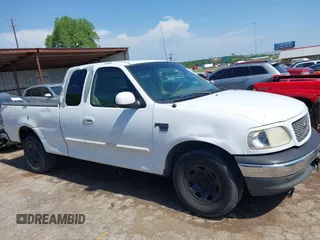 2001 Ford F-150 z VIN 1FTPX17LX1KB15016, wystawiony jako IAAI lot #42320637 z przebiegiem 567 424 mil mil oraz . Historia ofert i sprzedaży dostępna na DreamBid. Obrazek 14.