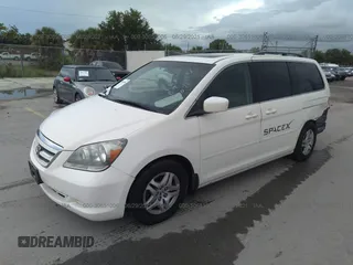 2006 Honda Odyssey EX-L with VIN 5FNRL38756B084148, listed as a IAAI auction lot 41694915 with 164,915 mi miles. Bid and sale history available at carsss.com. Image 2.