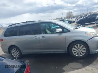 2015 Toyota Sienna XLE with VIN 5TDYK3DC2FS640204, listed as a IAAI auction lot 41772349 with 104,156 mi miles. Bid and sale history available at carsss.com. Image 14.