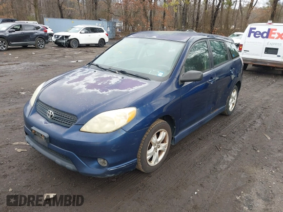 2006 Toyota Matrix STD with VIN 2T1KR32E26C596932, listed as a IAAI auction lot 41706466 with 241,246 mi miles. Bid and sale history available at carsss.com. Image 2.