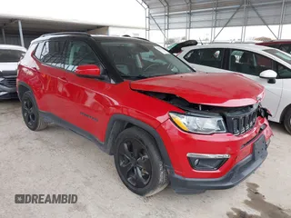 2020 Jeep Compass Latitude with VIN 3C4NJCBBXLT147596, listed as a IAAI auction lot 41382747 with 50,572 mi miles and . Bid and sale history available at carsss.com. Image 1.