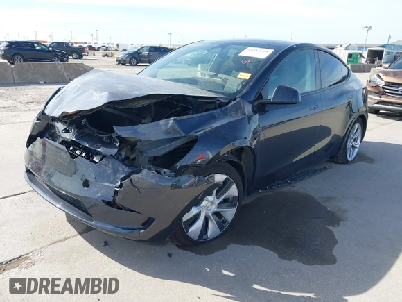 2024 Tesla Model Y with VIN 7SAYGDED9RF044789, listed as a IAAI auction lot 41817318 with Not Provided miles and . Bid and sale history available at DreamBid. Image 20.