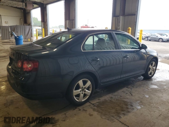 2009 Volkswagen Jetta SE z VIN 3VWRZ71KX9M167334, wystawiony jako Copart lot #63056825 z przebiegiem 187 466 mil mil oraz Szkoda całkowita • Salvage title. Historia ofert i sprzedaży dostępna na DreamBid. Obrazek 3.