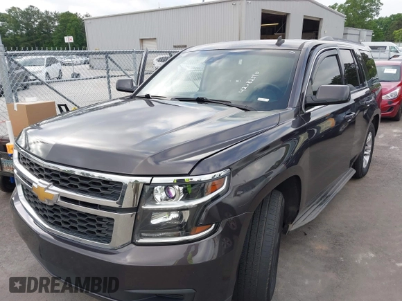 2015 Chevrolet Tahoe LS with VIN 1GNSCAKC0FR245826, listed as a IAAI auction lot 42282590 with 164,208 mi miles and . Bid and sale history available at DreamBid. Image 17.