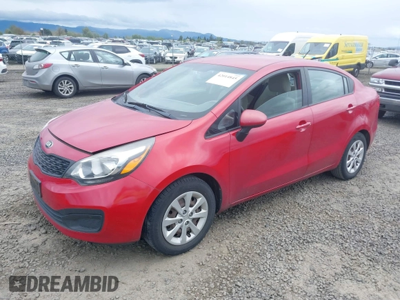 2013 Kia Rio LX with VIN KNADM4A30D6179274, listed as a IAAI auction lot 42014845 with 115,238 mi miles. Bid and sale history available at carsss.com. Image 2.
