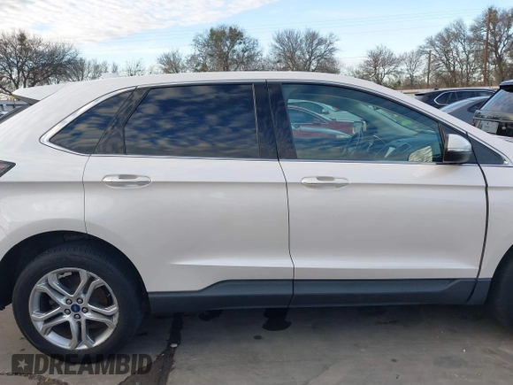 2017 Ford Edge Titanium z VIN 2FMPK4K92HBB10842, wystawiony jako IAAI lot #41307667 z przebiegiem 109 385 mil mil oraz . Historia ofert i sprzedaży dostępna na DreamBid. Obrazek 14.