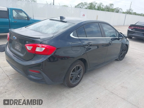 2017 Chevrolet Cruze LT with VIN 1G1BE5SM3H7201099, listed as a IAAI auction lot 41934728 with 141,369 mi miles and . Bid and sale history available at DreamBid. Image 4.