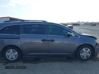 2015 Honda Odyssey LX with VIN 5FNRL5H29FB032327, listed as a IAAI auction lot 42052043 with 153,365 mi miles and . Bid and sale history available at DreamBid. Image 13.