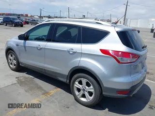 2016 Ford Escape SE with VIN 1FMCU0GX7GUB72822, listed as a IAAI auction lot 42136764 with 98,497 mi miles. Bid and sale history available at carsss.com. Image 3.