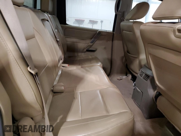 2010 Nissan Titan LE with VIN 1N6BA0EC1AN320311, listed as a Copart auction lot 85157484 with 234,050 mi miles and Salvage Title. Bid and sale history available at carsss.com. Image 10.