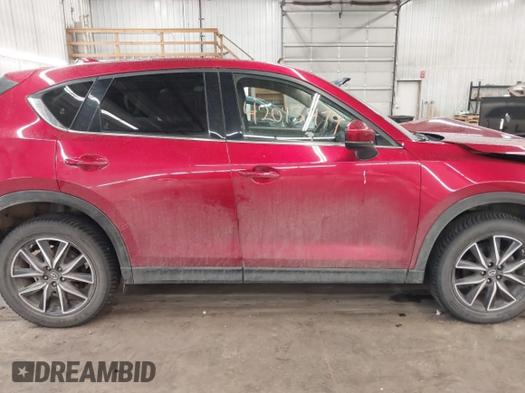 2018 Mazda CX-5 Grand Touring with VIN JM3KFBDM5J0414013, listed as a IAAI auction lot 42013479 with 88,225 mi miles and . Bid and sale history available at DreamBid. Image 14.