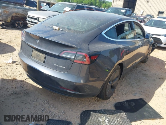 2019 Tesla Model 3 Long Range with VIN 5YJ3E1EB2KF510398, listed as a IAAI auction lot 42067654 with 108,971 mi miles and . Bid and sale history available at DreamBid. Image 4.