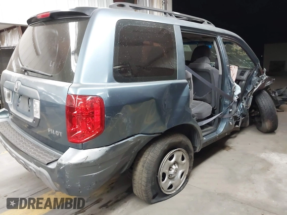 2005 Honda Pilot LX z VIN 2HKYF18135H537704, wystawiony jako IAAI lot #41091540 z przebiegiem Nie podano mil oraz . Historia ofert i sprzedaży dostępna na DreamBid. Obrazek 4.