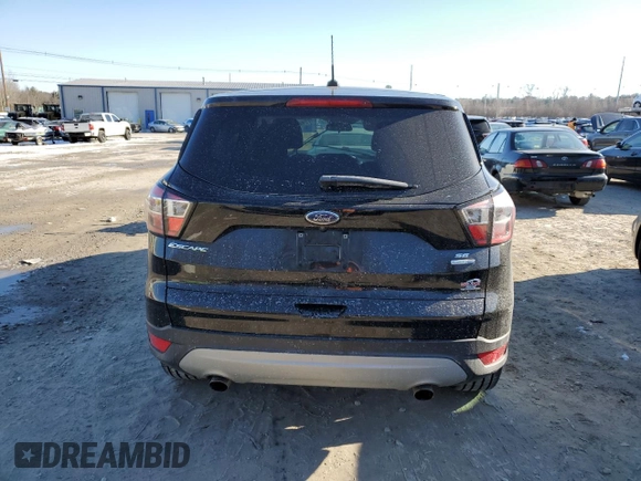 2017 Ford Escape SE with VIN 1FMCU9GD0HUD01592, listed as a Copart auction lot 88724565 with 110,255 mi miles and Salvage Title. Bid and sale history available at DreamBid. Image 6.