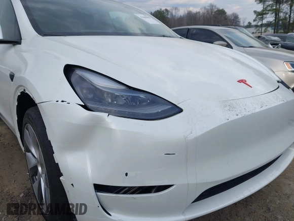 2023 Tesla Model Y Long Range with VIN 7SAYGDEE2PF765395, listed as a IAAI auction lot 41688080 with 27,792 mi miles and . Bid and sale history available at DreamBid. Image 21.