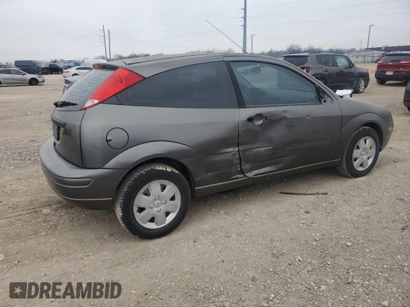 2007 Ford Focus S with VIN 1FAFP31N87W226088, listed as a Copart auction lot 88584555 with 83,896 mi miles and Salvage Title. Bid and sale history available at DreamBid. Image 3.