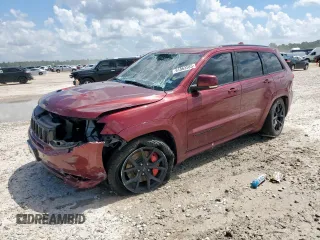 2018 Jeep Grand Cherokee SRT z VIN 1C4RJFDJ0JC263812, wystawiony jako Copart lot #61863585 z przebiegiem 62 819 mil mil oraz Szkoda całkowita • Salvage title. Historia ofert i sprzedaży dostępna na DreamBid. Obrazek 1.