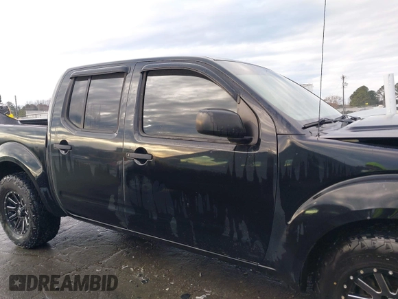 2014 Nissan Frontier SV with VIN 1N6AD0ER9EN715608, listed as a IAAI auction lot 41306919 with 181,107 mi miles and . Bid and sale history available at DreamBid. Image 13.