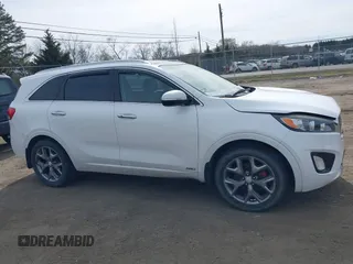 2016 Kia Sorento SX z VIN 5XYPKDA54GG101802, wystawiony jako IAAI lot #41784161 z przebiegiem 99 162 mil mil oraz . Historia ofert i sprzedaży dostępna na DreamBid. Obrazek 13.
