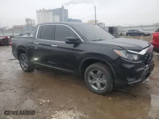 2021 Honda Ridgeline RTL-E with VIN 5FPYK3F70MB021965, listed as a Copart auction lot 43346265 with 71,686 mi miles and Salvage Title. Bid and sale history available at carsss.com. Image 4.