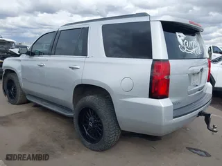 2018 Chevrolet Tahoe LT with VIN 1GNSCBKC2JR115318, listed as a IAAI auction lot 41809253 with 107,217 mi miles. Bid and sale history available at carsss.com. Image 3.