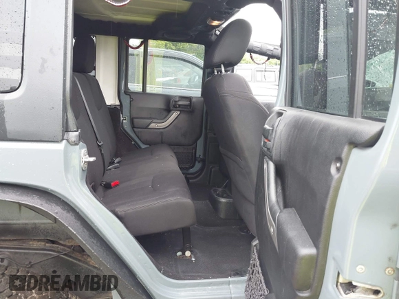 2014 Jeep Wrangler Unlimited Sport with VIN 1C4BJWDG1EL135073, listed as a IAAI auction lot 42435361 with 129,144 mi miles and . Bid and sale history available at DreamBid. Image 8.